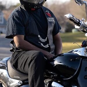 biker wearing a vest with patches and vest extenders